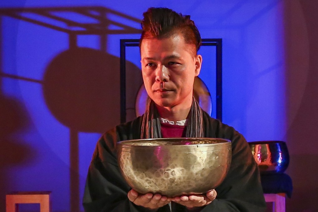 Tsang Man-tung, a master of the Himalayan singing bowl, performs at the Asia Society in Admiralty. Photo: Jonathan Wong