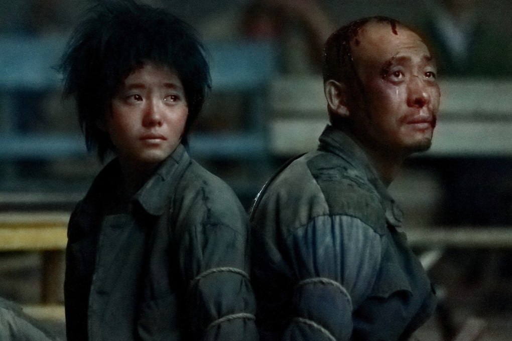 Zhang Yi and Fan Wei in a scene from One Second, directed by Zhang Yimou. The film was withdrawn from competition at the Berlin International Film Festival earlier this week.