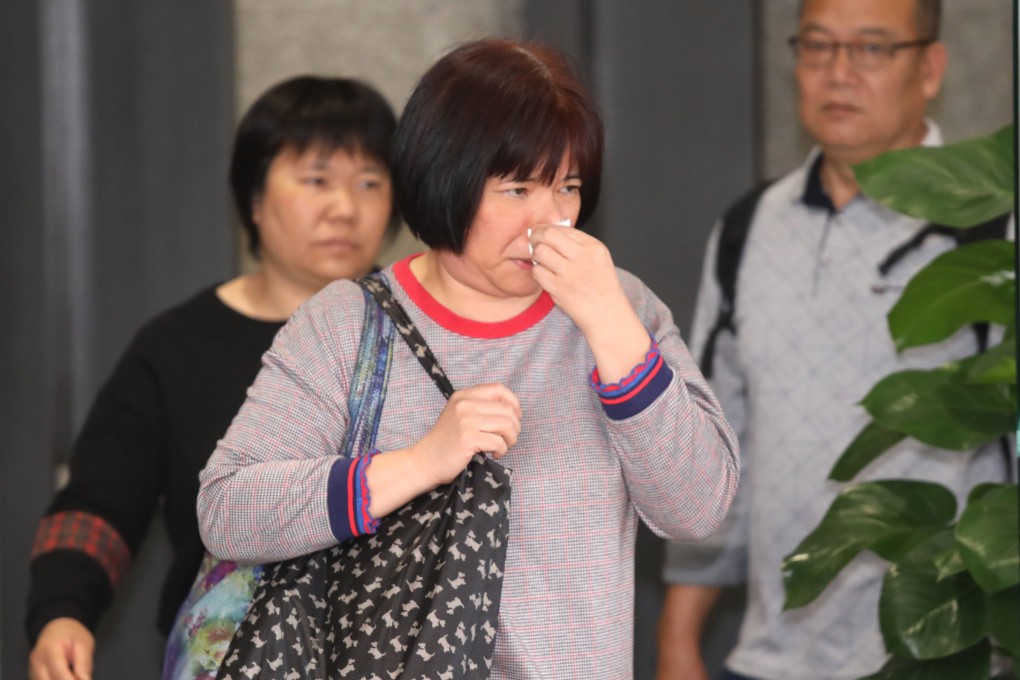 Lee Suet-kwan (centre) mother of the late Huang Zhiqiang at the hearing. Photo: K. Y. Cheng