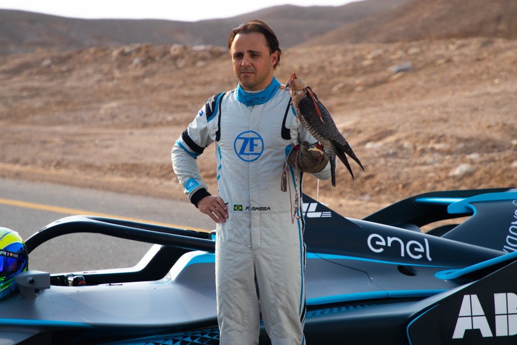 Felipe Massa with a peregrine falcon in the Saudi Arabian desert. Beating the falcon in a drag race has proved easier for Massa than beating his Formula E rivals. Photo: Handout
