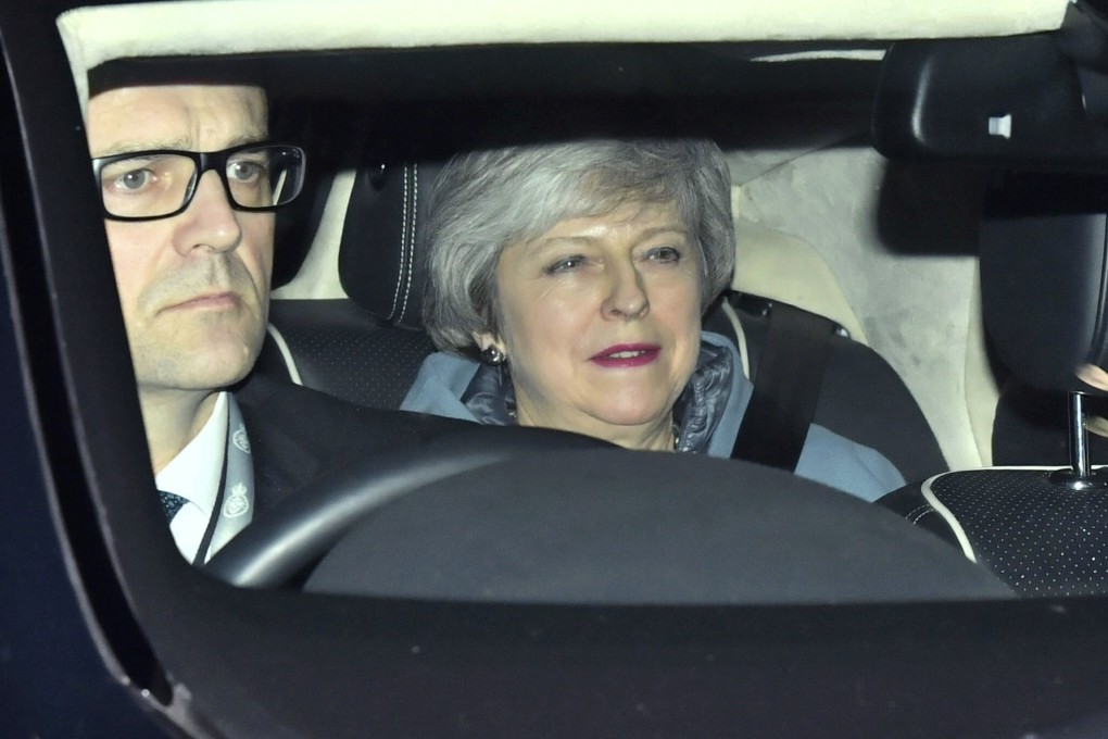Britain's Prime Minister Theresa May leaves the Houses of Parliament in Westminster after a Brexit vote in the House of Commons on Thursday. Photo: AP