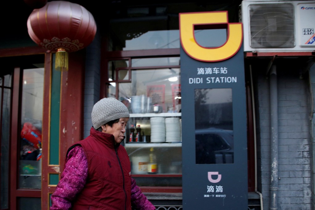 The logo of Didi Chuxing is seen at a Didi station in Beijing. Photo: Reuters