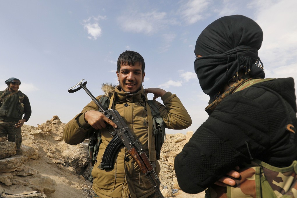 The Syrian Observatory for Human Rights said IS fighters were surrendering in large numbers to the advancing SDF fighters. Photo: AFP