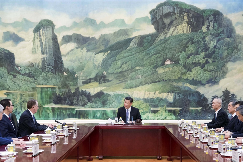 Chinese President Xi Jinping (centre) meets the trade negotiators in Beijing on Friday. Photo: Xinhua