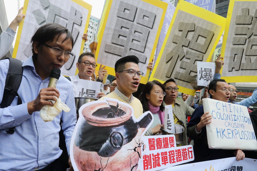 Protest spokesman Roy Tam (left) and lawmaker Gary Fan (second from left, at front). Photo: Dickson Lee