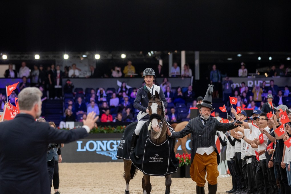 Denis Lynch celebrates his victory with fans at the Longines Grand Prix of Hong Kong. Photo: Jessica Rodrigues
