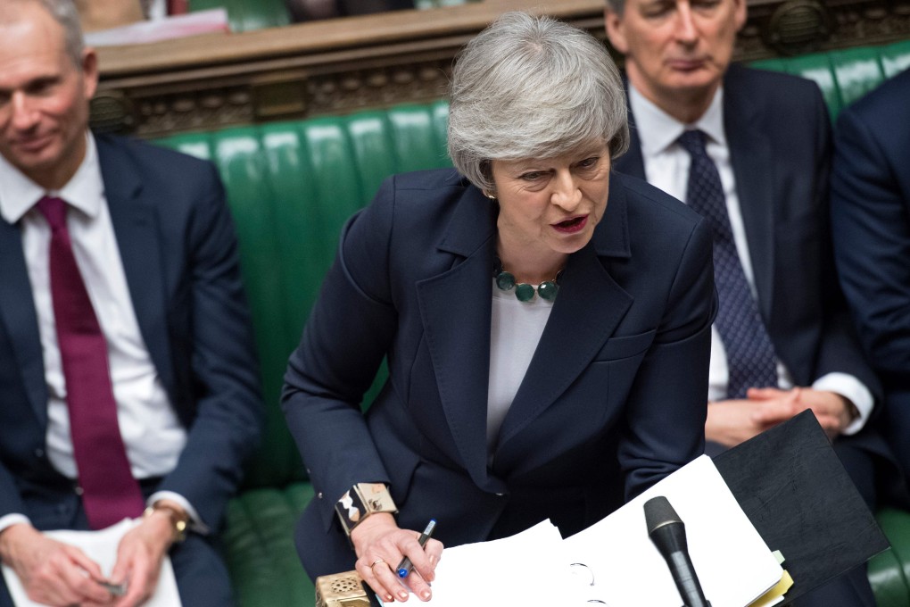 Britain's Prime Minister Theresa May (C) speaking during Prime Minister's Questions. Photo: AFP Photo