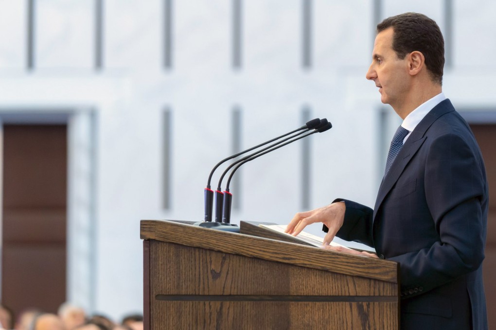 President Bashar al-Assad delivering a speech at a meeting for the heads of local councils in the Damascus. Photo: AFP/Syrian Presidency Facebook page