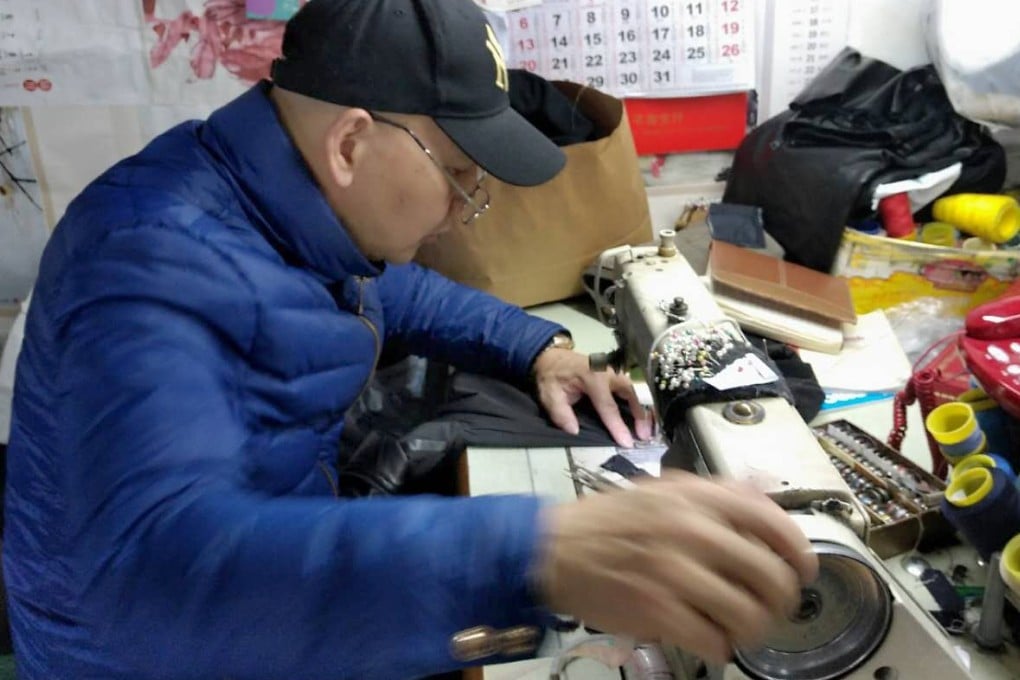 Shi Guomin started doing alterations in the 1980s and plans to keep going as long as he can. Photo: Handout