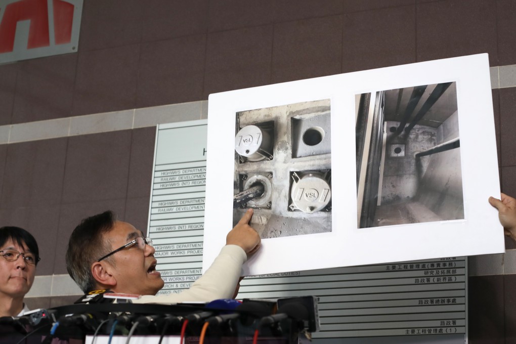 Highways Department officials explain why the cable broke. Photo: Xiaomei Chen