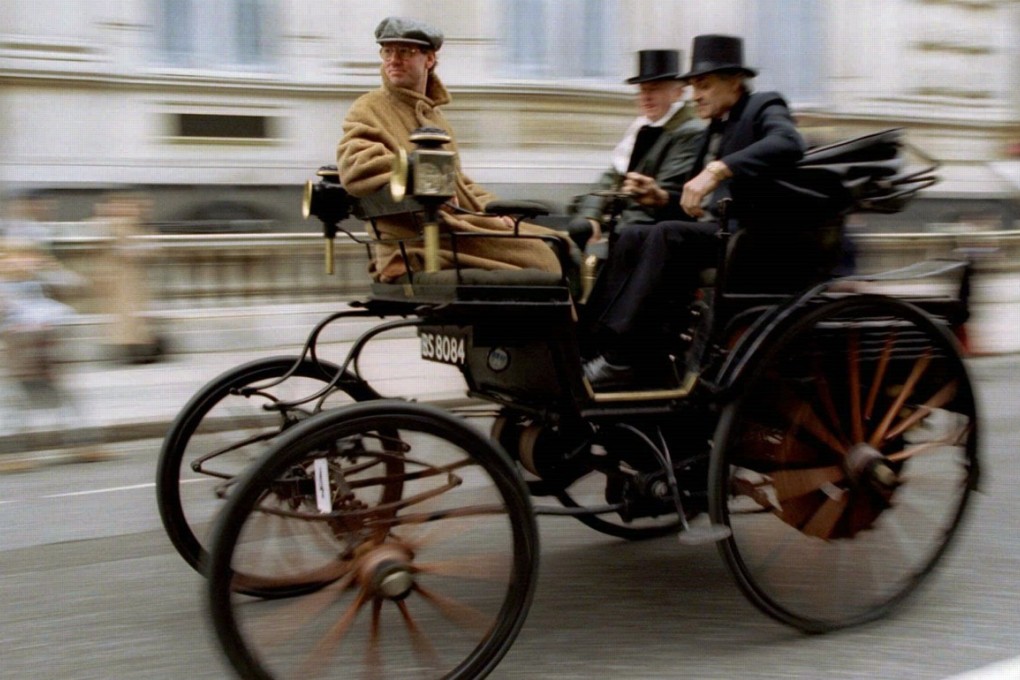 A Lutzmann vintage car made in 1896 makes its way down Whitehall  during a re-enactment of the first London to Brighton rally. This Lutzmann is believed to have taken part in the very first rally one hundred years ago. Photo: Reuters