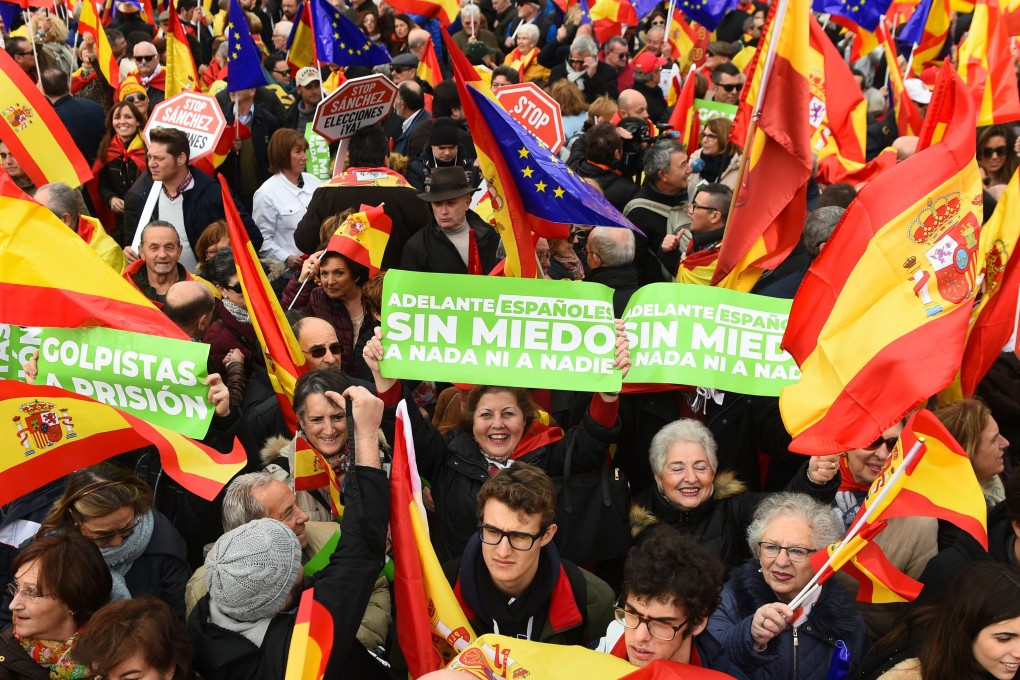 People participate in a rally on February 10 in Madrid, Spain, called by the People’s Party and Ciudadanos to demand a general election. The rally was organised to protest against talks between Prime Minister Pedro Sanchez’s government and Catalan pro-independence leaders. Photo: EPA-EFE