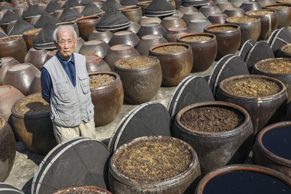 Pang Chuk-lui, 90, is a soy sauce maker in Sheung Shui, whose business is facing its sunset years. Photo: Dickson Lee