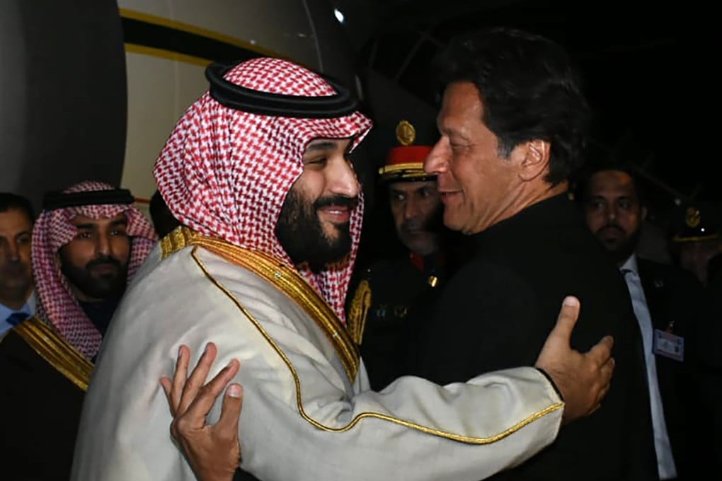 Pakistan’s Prime Minister Imran Khan (right) greets Saudi Arabian Crown Prince Mohammed bin Salman (left) upon his arrival at the military Nur Khan Air Force base in Islamabad. Photo: Handout via AP