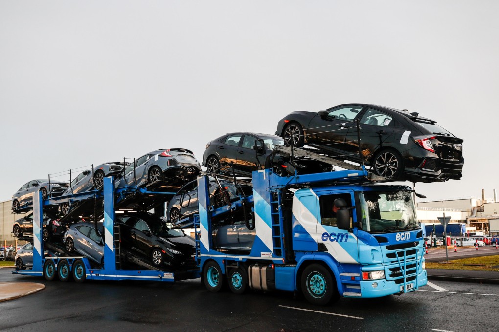 A lorry with car carrier trailer leaves the Honda car plant in Swindon, Britain on February 18, 2019. Photo: REUTERS