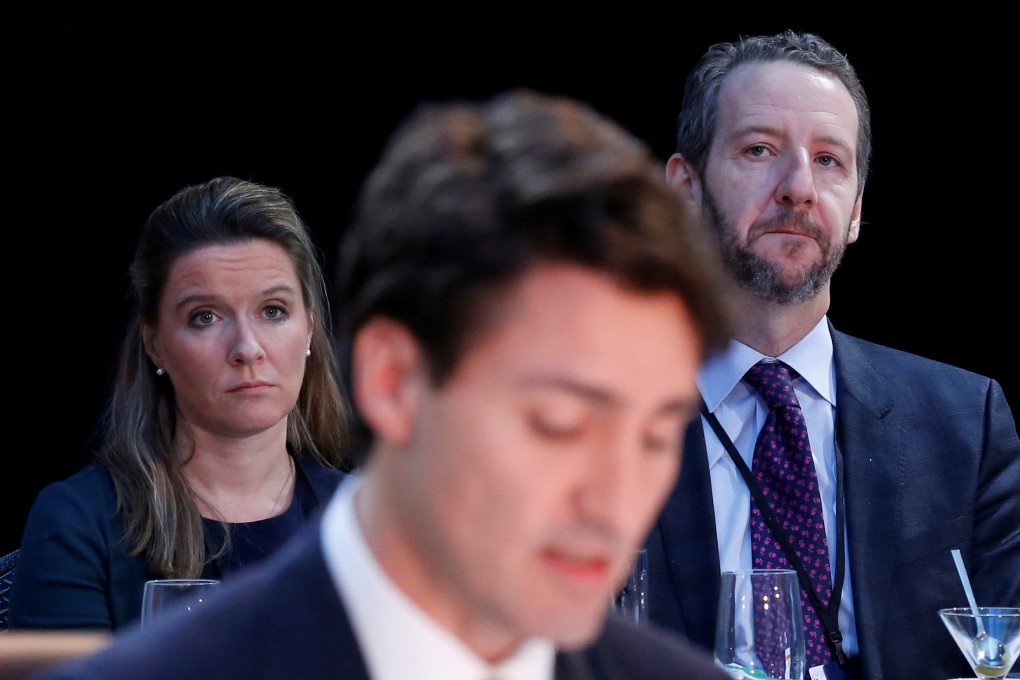 Canadian Prime Minister Justin Trudeau speaks as principal secretary Gerald Butts and chief of staff Katie Telford listen in 2016. Butts quit on Monday, accused of political meddling in a bribery case. Photo: Reuters