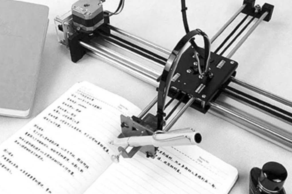 One of the robots capable of writing school homework, in a choice of fonts or even the user’s own handwriting. Photo: Thepaper.cn