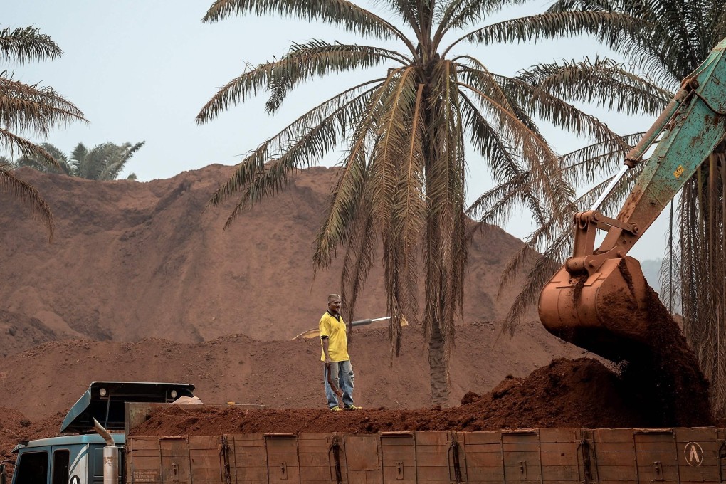 An excavator at a bauxite storage site in Bukit Goh situated in Malaysia’s rural state of Pahang. Photo: AFP