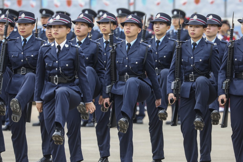 Probationary inspectors and recruit constables attend the police passing-out parade, at the Hong Kong Police College in Wong Chuk Hang on February 16. Photo: Dickson Lee