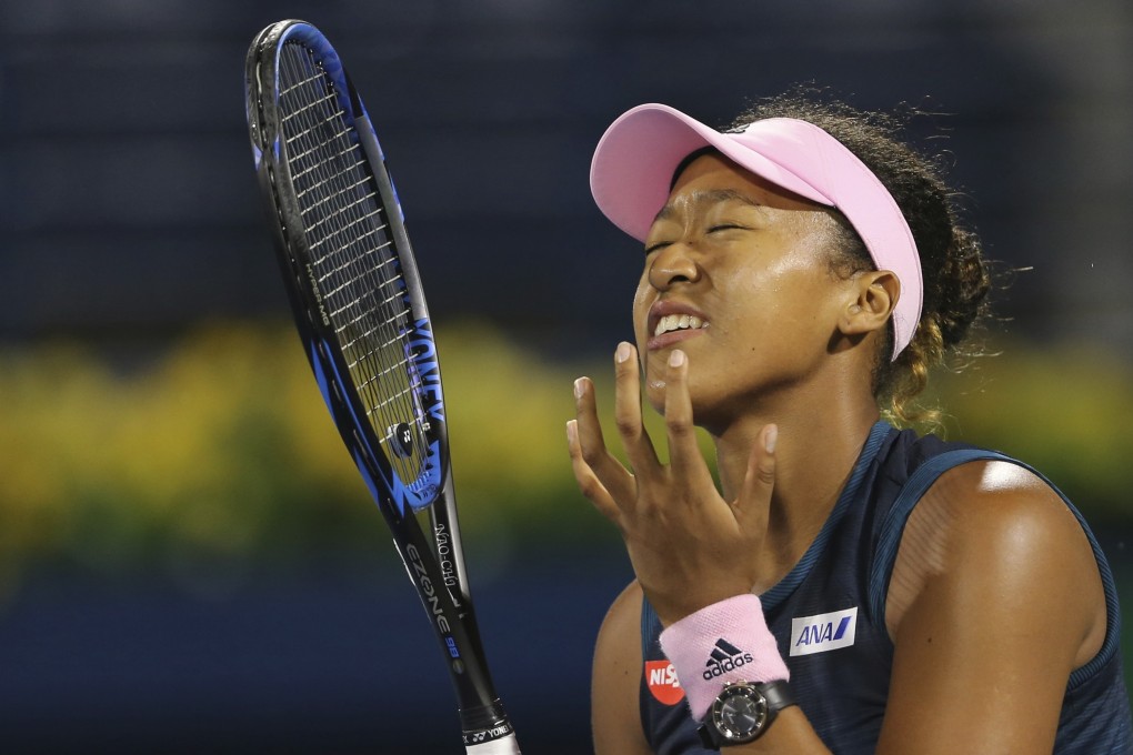 Naomi Osaka reacts during her match against Kristina Mladenovic at the Dubai Duty Free Tennis Championships. Photo: AP
