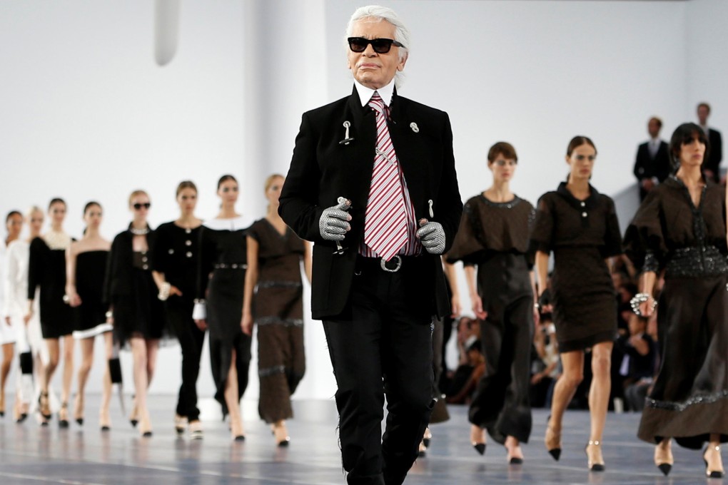 File photo of German designer Karl Lagerfeld at the end of his Spring/Summer 2013 women’s ready-to-wear fashion show for French fashion house Chanel during Paris fashion week in October 2012. Photo: Reuters