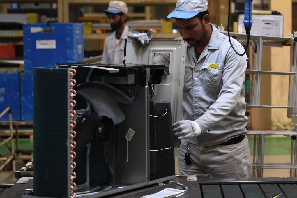Workers on the production line at the Daikin air-conditioning plant in Neemrana, southwest of New Delhi. According to a Deloitte survey, India is expected to be one of the world’s top five manufacturing nations by 2020. Photo: AFP