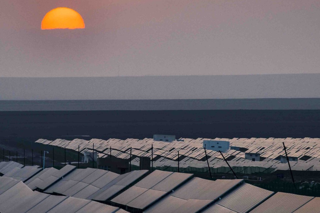 A photovoltaic power plant in Turpan, in northwest China’s Xinjiang Uygur autonomous region, is part of the country’s push towards green energy. Photo: Xinhua