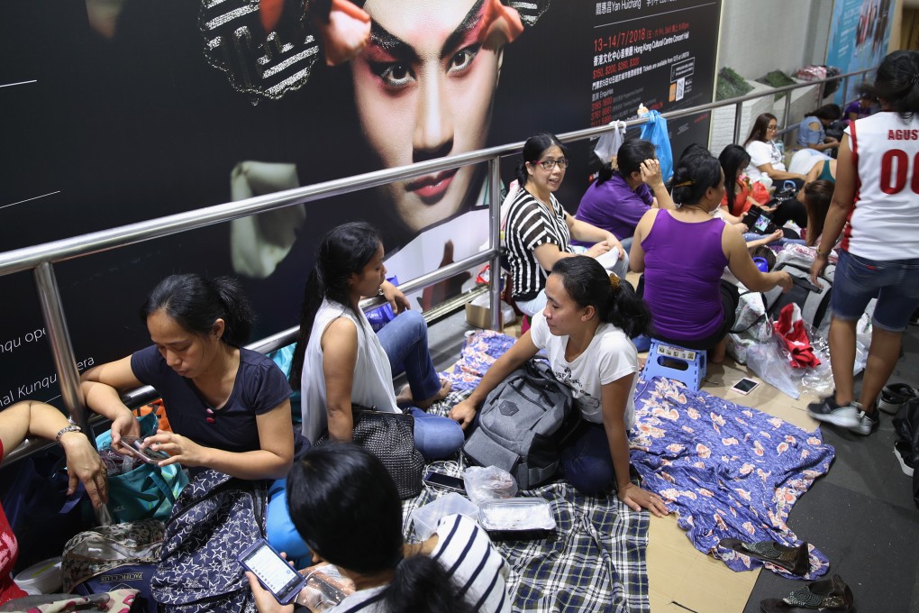 Domestic workers gather in Central on a public holiday. Photo: Edward Wong