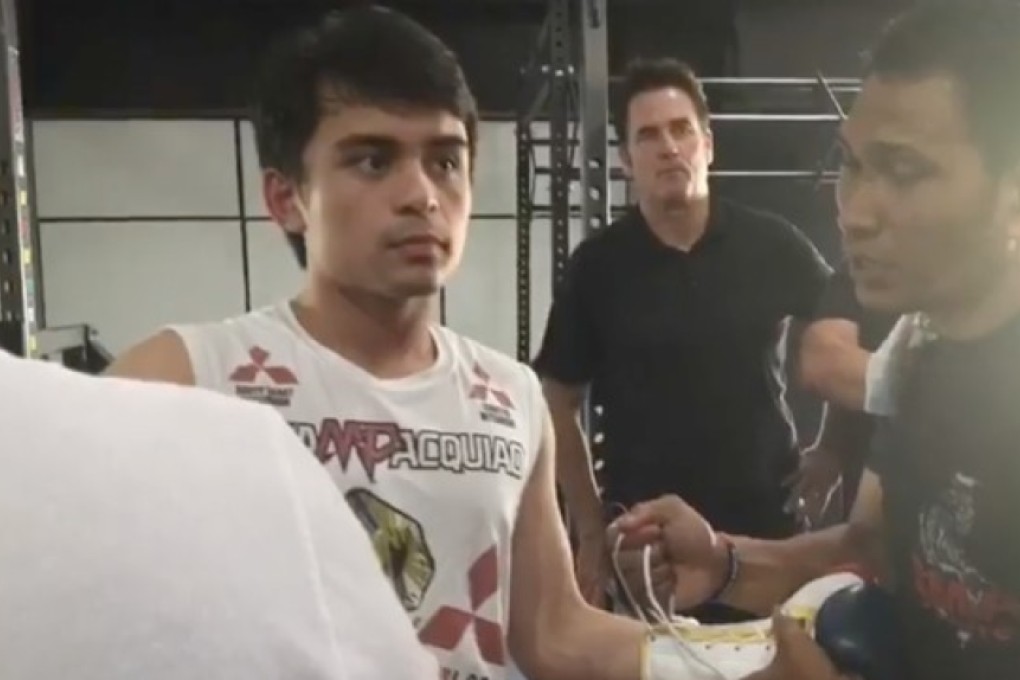Jimuel Pacquiao tapes up before his fight. Photo: YouTube