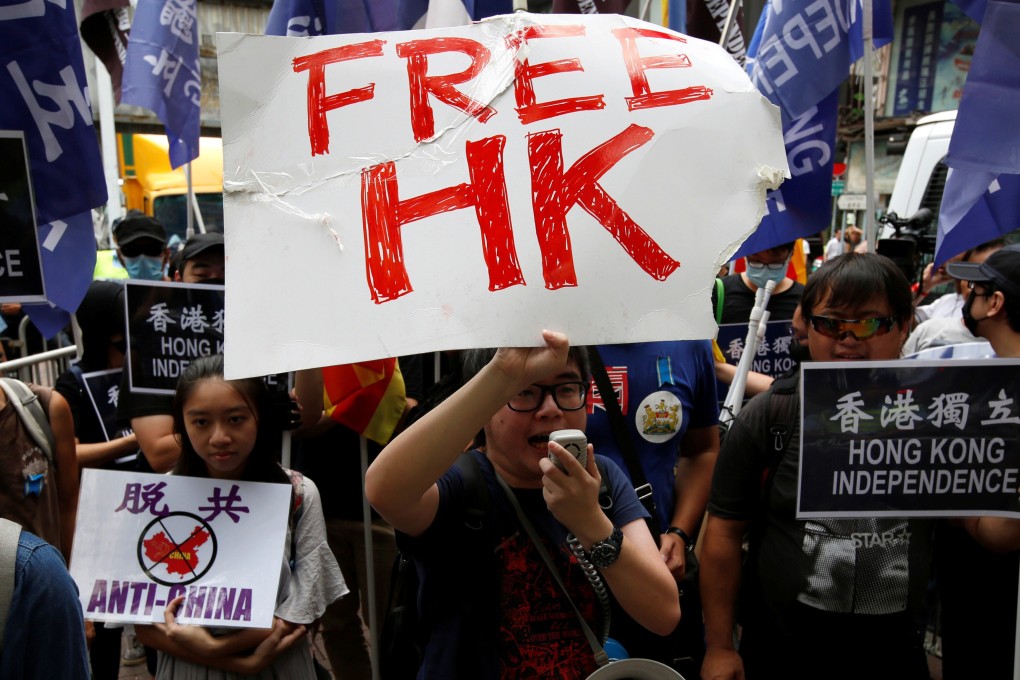 Pro-Hong Kong independence protesters demonstrate in Hong Kong on China's National Day. Photo: Reuters