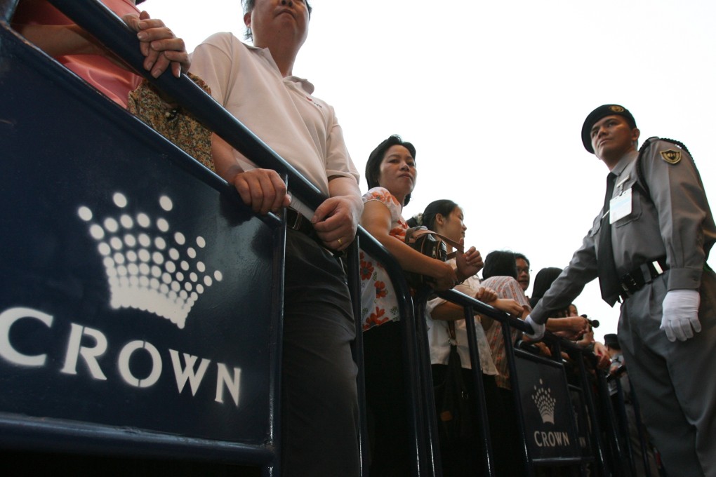 People queue at the grand opening of casino and hotel Crown Macau in Taipa. Photo: SCMP Pictures