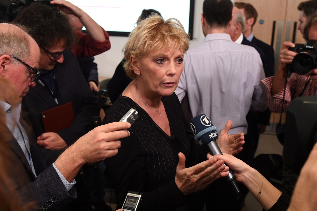In this file photo taken on December 11, 2018 Pro-Europe British politician, Conservative party MP Anna Soubry (C) speaks to members of the media. Photo: AFP