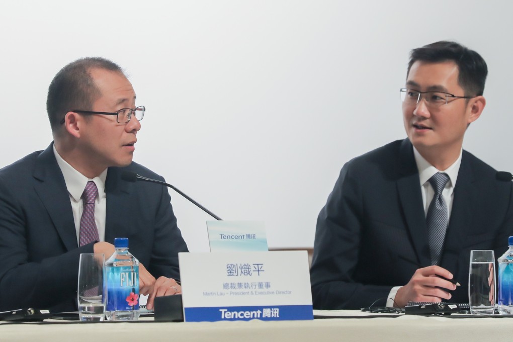 Martin Lau Chi-ping, president of Tencent Holdings, left, and Pony Ma Huateng, the company’s chairman and chief executive, preside over a news conference in Hong Kong on March 22, 2017. Photo: Bloomberg