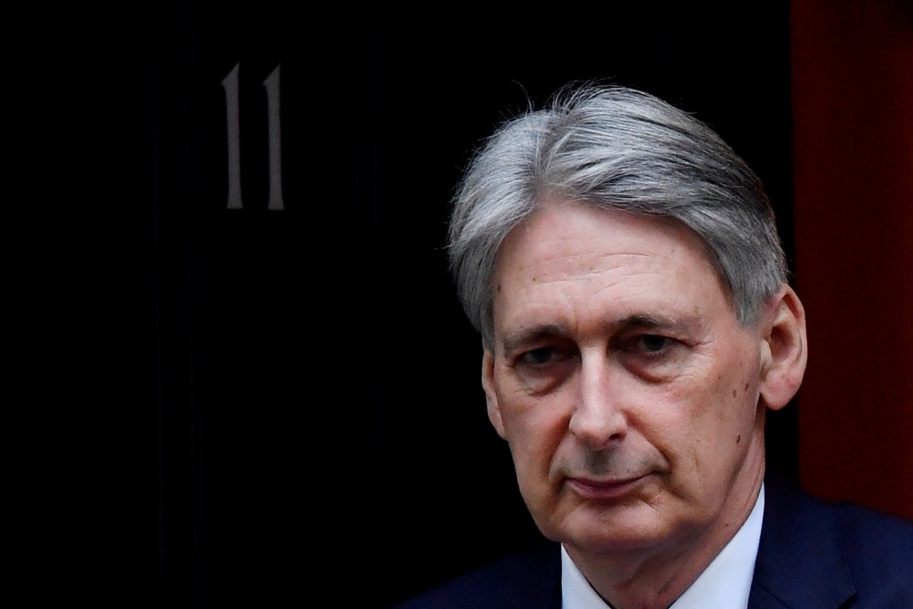 Britain’s Chancellor of the Exchequer Philip Hammond is seen outside Downing Street in London. Photo: Reuters