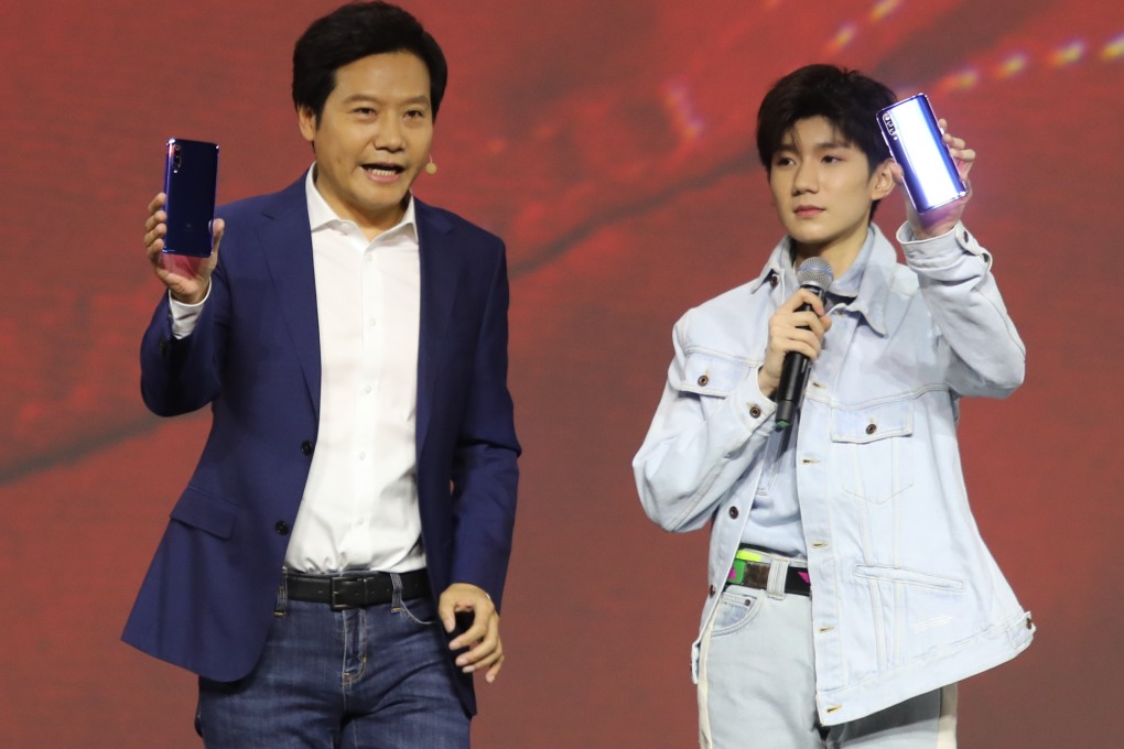 Xiaomi chief executive Lei Jun, left, with brand ambassador Wang Yuan. Photo: Handout