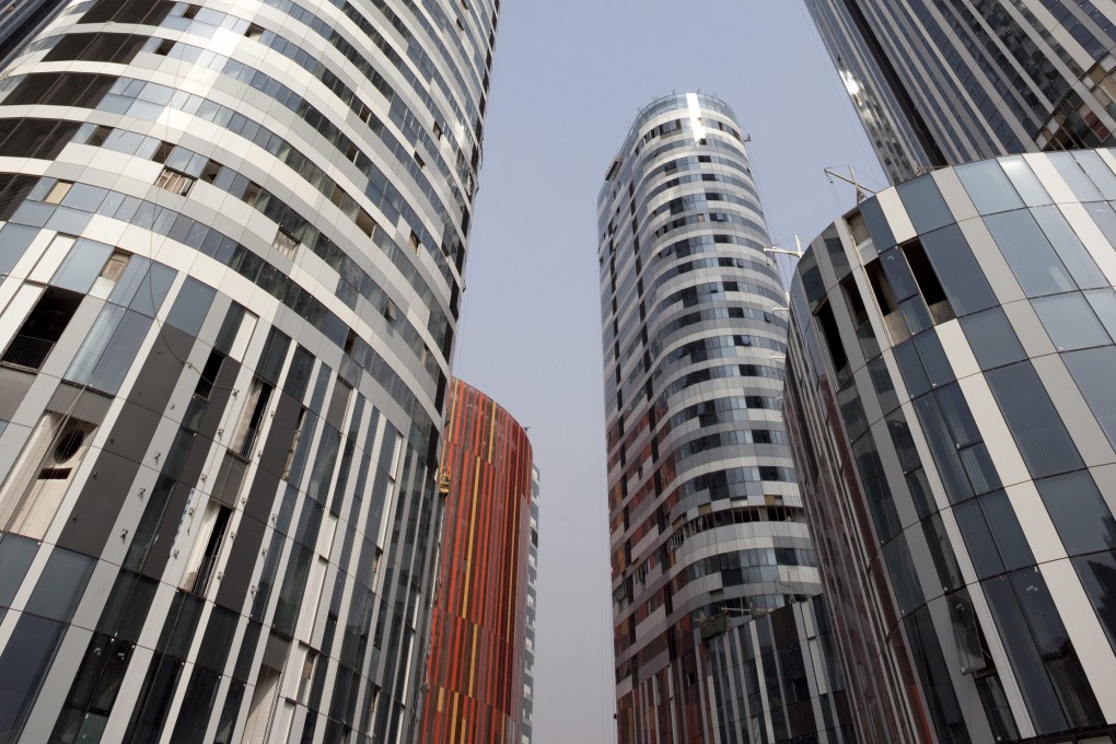 The entry of foreign securities firms, fund houses and insures that have been allowed to set up directly controlled ventures in China will, on the other hand, boost office demand, according to JLL North China. Photo: EPA