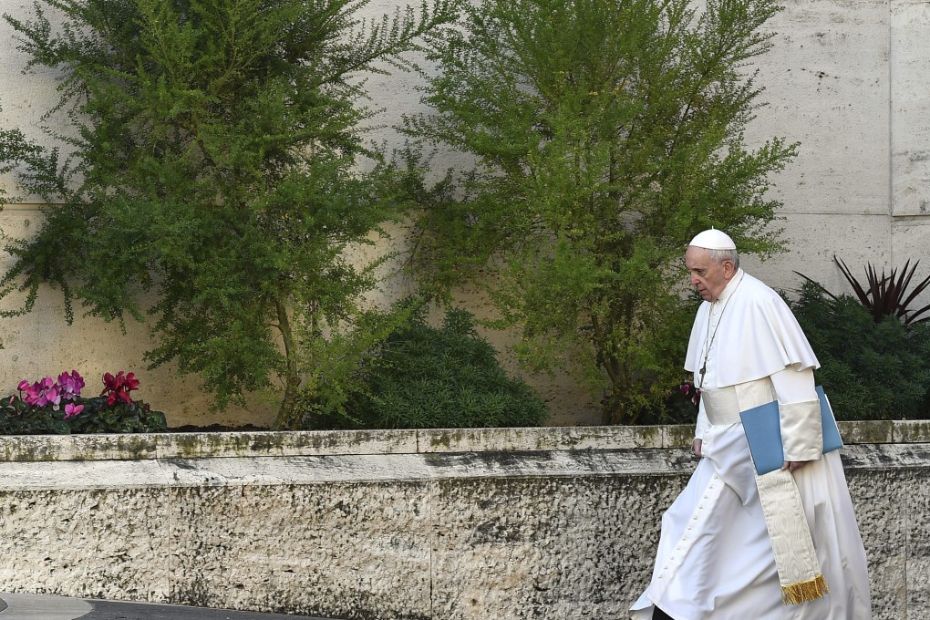 Pope Francis arrives for the opening of a sex abuse prevention summit, at the Vatican. Photo: AP