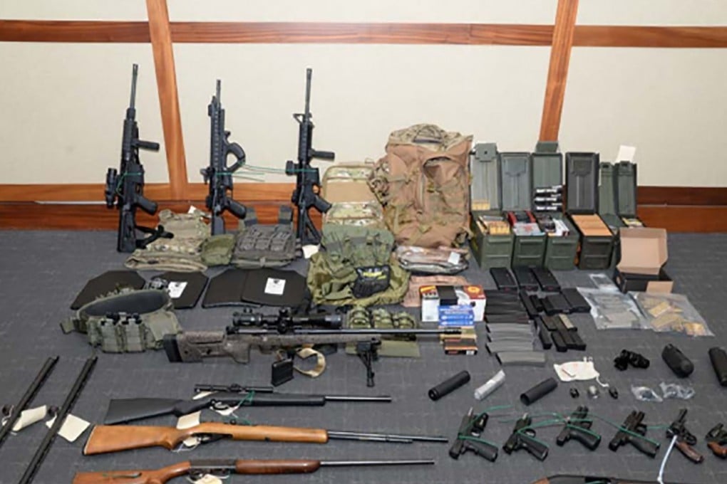 Law enforcement officers seized 15 guns and 1,000 rounds of ammunition from his home. Photo: AFP