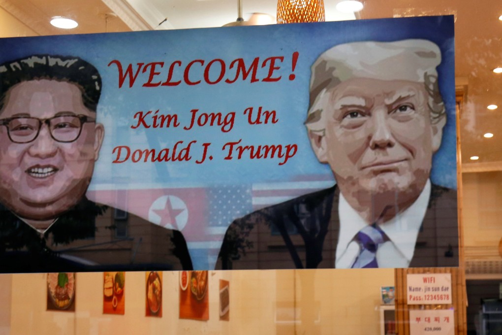 A welcoming banner for US President Donald Trump and North Korean leader Kim Jong-un. Photo: Reuters