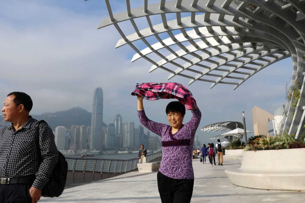 Tourists at the Avenue of Stars in Tsim Sha Tsui on the first day after its reopening in January. Photo: Sam Tsang