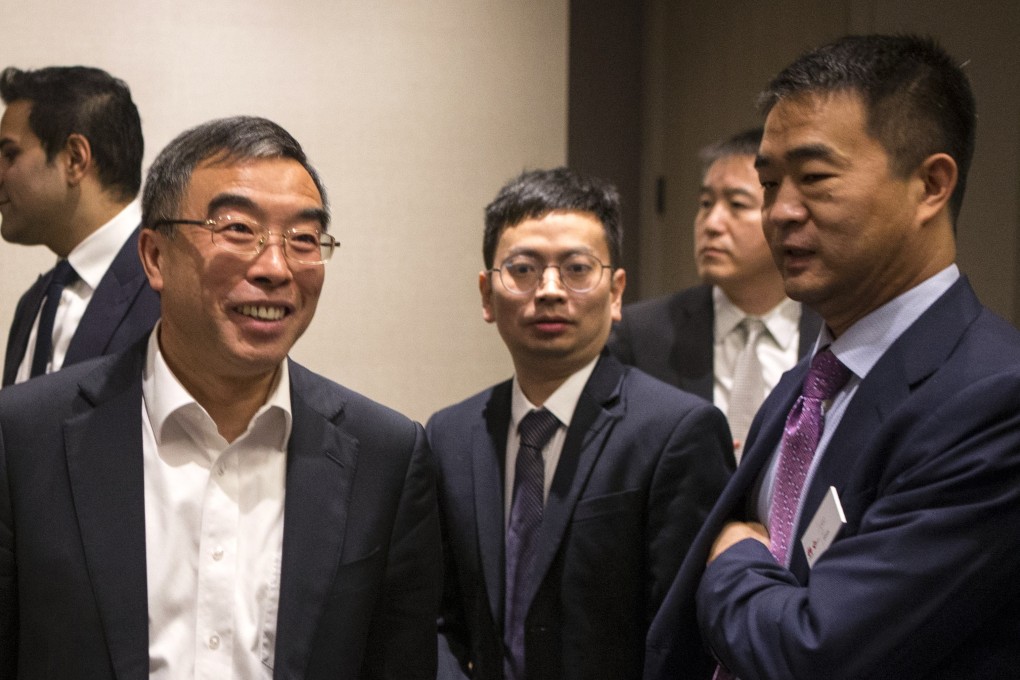 Liang Hua (left), chairman of Huawei's board of directors, and Eric Li (right), president of Huawei Technologies Canada, after a media round table event in Toronto on Thursday. Photo: AP