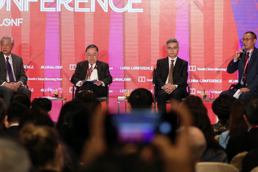 (L-R): Professor of Practice, Peking University HSBC Business School, Professor of Practice in Business and Economics, the University of Hong Kong, Professor Geng Xiao; Chairman, Hang Lung Properties, Ronnie Chan; President, America China Public Affairs Institute, Fred Teng; and Editorial Advisor at SCMP, Wang Xiang-wei, at the SCMP China Conference at JW Marriott Hotel in Admiralty. 21FEB19 SCMP / Nora Tam