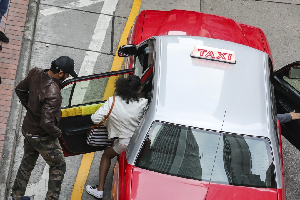 Hong Kong lawmakers are discussing ways to enhance taxi service quality by increasing fines and penalties on bad drivers. Photo: Felix Wong