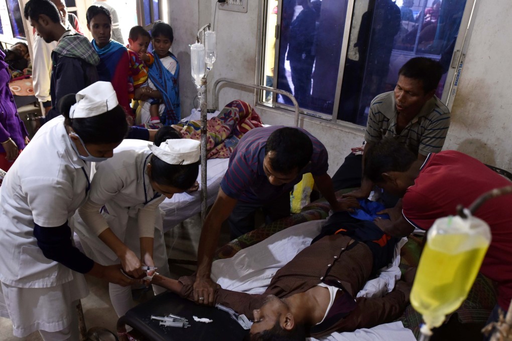 A patient who drank toxic liquor is treated at a hospital in India’s Assam state. Photo: AFP