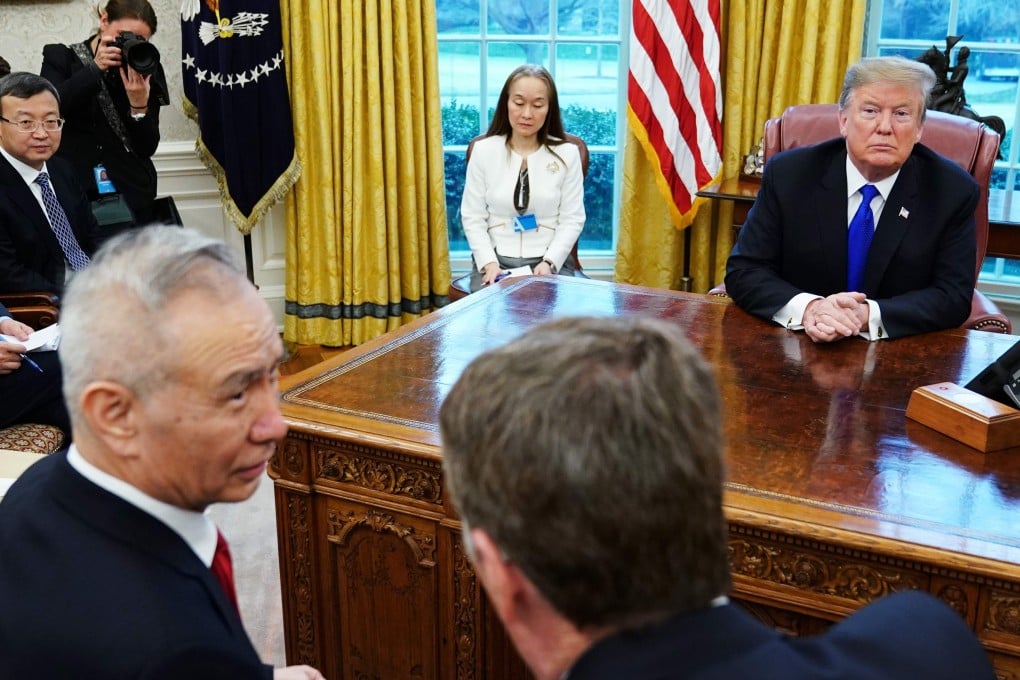 US President Donald Trump watches as Chinese Vice-Premier Liu He (left) speaks with US Trade Representative Robert Lighthizer (right) in the Oval Office on Friday. Photo: AFP