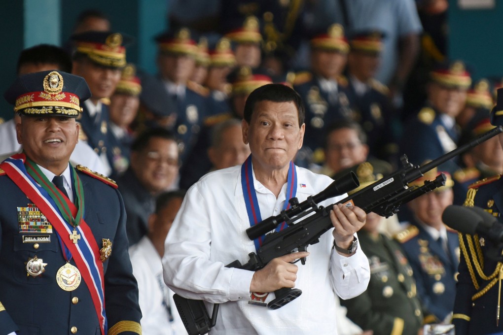 Former police chief Ronald Bato Dela Rosa with President Rodrigo Duterte. Photo: Reuters