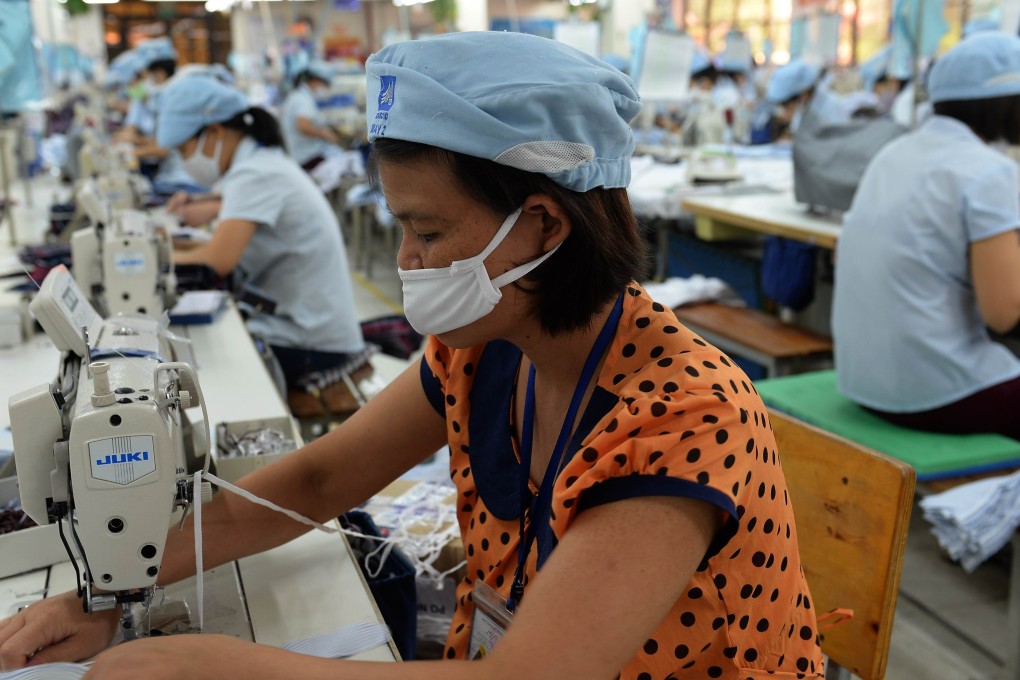 Female employees at a garment factory in Hanoi. Photo: AFP