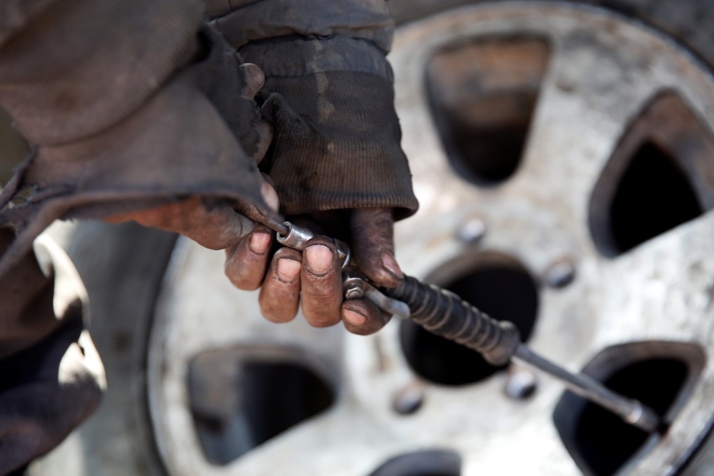 Hong Kong man dies after truck tyre he was inflating explodes | South ...