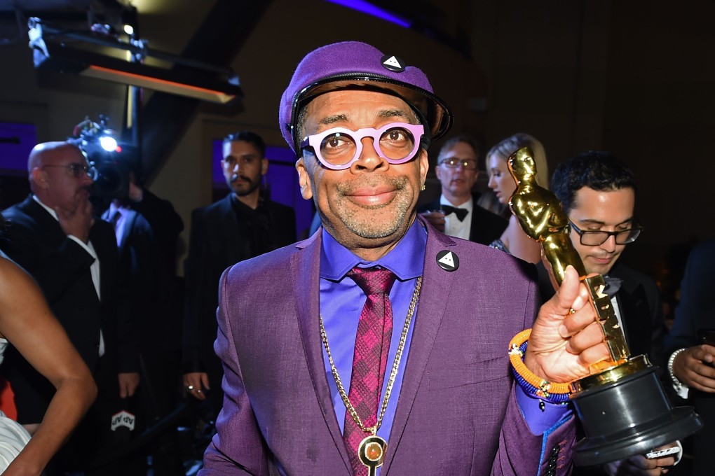 Spike Lee with his first competitive Oscar, for best adapted screenplay for his film BlacKkKlansman, at the post-Academy Awards Governors Ball in Hollywood. Photo: AFP
