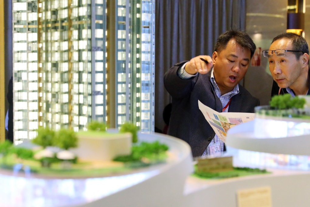 Potential buyers examine the Grand Central Phase 2, a Kwun Tong residential project by Sino Land and the Urban Renewal Authority. Photo: Edmond So